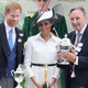 Prince Harry, Duke of Sussex, and Meghan, Duchess of Sussex, present the winners cup to breeder John Gunther at Ascot Racecourse on June 19, 2018, in Ascot, England.